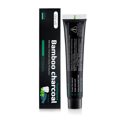 Bamboo toothbrush set with activated coconut charcoal toothpaste and our all natural teeth whitener